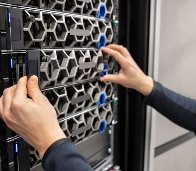 Hands Of Male IT Support Professional Adjusting Hardware Hands Of Male IT Support Professional Adjusting Hardware